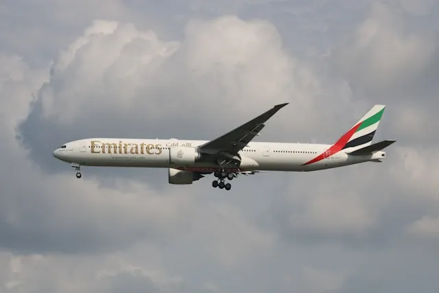 Boeing 777-200LR flying long-haul route over the ocean demonstrating ultra-long range capabilities